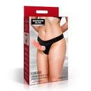 Cherie Thong Strap-On Panty Harness Medium Black packaging on display featuring a model wearing the harness.