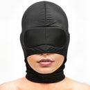 Master Series Cocksucker Blindfold Hood Black worn by a model, emphasizing sensory deprivation and focus.