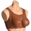Perky Pair D-Cup Silicone Breasts Dark displayed on a mannequin, showcasing a realistic D-cup silhouette.