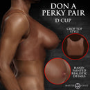 Perky Pair D-Cup Silicone Breasts Dark displayed on a model wearing a crop top with realistic details.