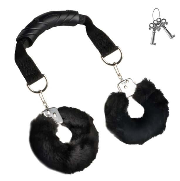 Master Series the Handler Furry Handcuffs with Handle featuring plush faux fur and a comfortable grip handle.