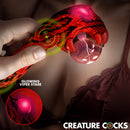 Creature Cocks Cobra Silicone Plasma Vibrator with glowing orb held in hand, showcasing vibrant design.