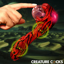 Person touching the plasma orb of the Creature Cocks Cobra Silicone Plasma Vibrator.