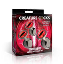 Creature Cocks Red Eye Metal Butt Plug Set 3 Piece packaging featuring three sizes for anal training and fantasy play.