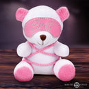 Master Series Brat Bondage Bear Plush Toy wrapped in pink rope with a bedazzled blindfold.