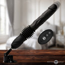 Double Pounder Silicone Vibrating Dildo Thruster with suction base and remote control on a wooden surface.