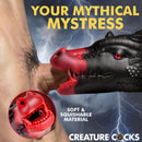 Creature Cocks Drago Silicone Masturbator Black shown in use with a hand, highlighting its soft and squishable material.