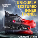 Creature Cocks Drago Silicone Masturbator Black showcasing its uniquely textured inner tunnel for enhanced pleasure.