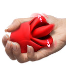Bloomgasm Petal Kiss Kissing and Licking Vibrator held in hand with lights indicating vibration settings.