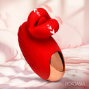 Mini Kisses Kissing and Vibrating Clitoral Stimulator in red silicone design on a soft surface.