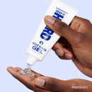 Passion Keep It Hard Stay Hard Desensitizing Gel 1.5 Oz being dispensed onto a hand.