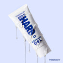 Passion Keep It Hard Stay Hard Desensitizing Gel 1.5 Oz in a tube, with gel dripping off, on a light background.