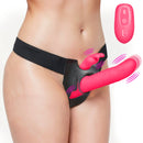 Thrusting & Vibrating Rabbit Strap-On with Harness showcased on a model, highlighting dual stimulation features.