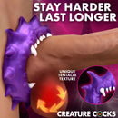 Creature Cocks Constrictor Silicone Cock Ring Purple showcasing unique tentacle texture and fangs for enhanced performance.