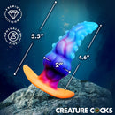 Glowtopus Glow-in-the-Dark Silicone Anal Plug with textured ridges, 5.5-inch length, and 2-inch width.