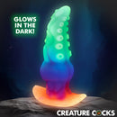 Glowtopus Glow-in-the-Dark Silicone Anal Plug displayed with vibrant colors that glow in the dark for exciting stimulation.