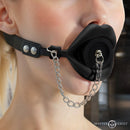 Master Series Plugged Silicone Feeding Gag Black worn by a model showcasing its design.
