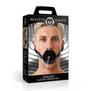 Master Series Plugged Silicone Feeding Gag Black packaging with model wearing the gag, showcasing its dual-function design.