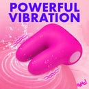 Bang Dual Silicone Clitoral Vibrator Pink resting on a pink surface, showcasing powerful vibrations and soft silicone design.