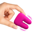 Bang Dual Silicone Clitoral Vibrator Pink being held, showcasing its compact design and soft silicone texture.