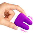 Hand holding the Bang Dual Silicone Vibrator Purple showcasing its soft silicone design and dual motor functionality.