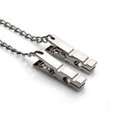 Master Series Naughty Pleasure Steel Nipple Clamps with chain, ideal for firm pressure and pleasure.