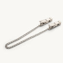 Master Series Naughty Pleasure Steel Nipple Clamps connected by chain, classic clothespin-style pressure.
