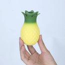 Maia Aloha Pineapple 10 Function Suction Vibrator in hand with playful pineapple design.