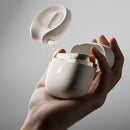 ZALO Apis Vibrating Couples Ring Turquoise Green in a hand, with the device displayed in its sleek case.