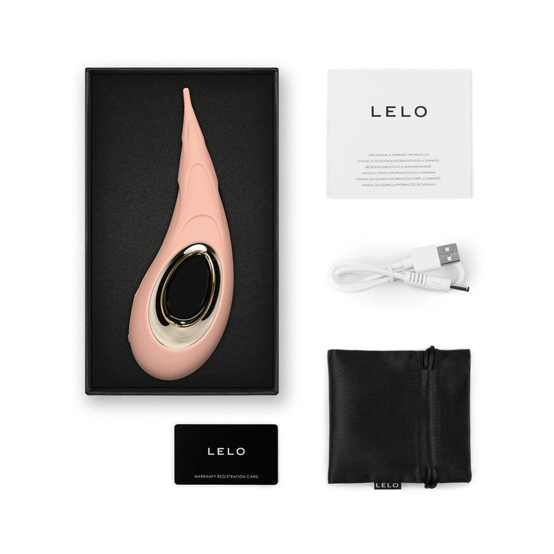 LELO DOT Cruise Peach Please clitoral vibrator in packaging with accessories and user manual.