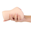 CutiePies Baker Becky Vagina Stroker with PowerBullet held in hand, showcasing its compact design and realistic texture.