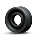 Performance Silicone Pump Sleeve Large Black shown from the side, features a smooth black silicone finish.