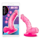 Naturally Yours 4 Inches Mini Cock Realistic Dildo Pink in packaging with a lifelike design for stimulation.