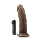 Dr Joe 8 Inch Vibrating Cock Chocolate Brown next to its power controller, showcasing realistic details and adjustable settings.