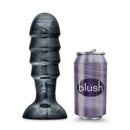 Jet Bruiser Carbon Metallic Black Butt Plug next to a beverage can for size comparison.