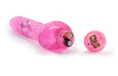 Naturally Yours Mr Right Now Vibrating Dildo 6.5 inch Pink with visible battery compartment and realistic design.