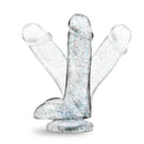 Naturally Yours 6 inches Glitter Cock Sparkling Clear Dildo showcased with a collection of shimmering clear glitter dildos.