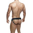 Dr Skin 6 Inches Hollow Strap On Beige worn with a black harness, showcasing a comfortable fit and realistic design.