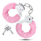 Pink faux fur-lined adjustable beginner cuffs with safety release lever and keys.