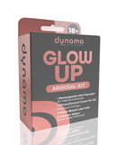 Dynamo Wellness Glow Up Arousal Kit packaging featuring mini massager, cream, lube foils, and intimate wipes.