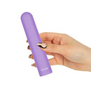 Person holding Power Bullet Eezy Pleezy Rechargeable 5-Inch Vibrator in purple, showcasing compact and sleek design for on-the-go pleasure.