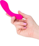 A hand holding The Mini Swan Wand 4.75 inches Pink vibrator, highlighting its compact design and vibrant color.