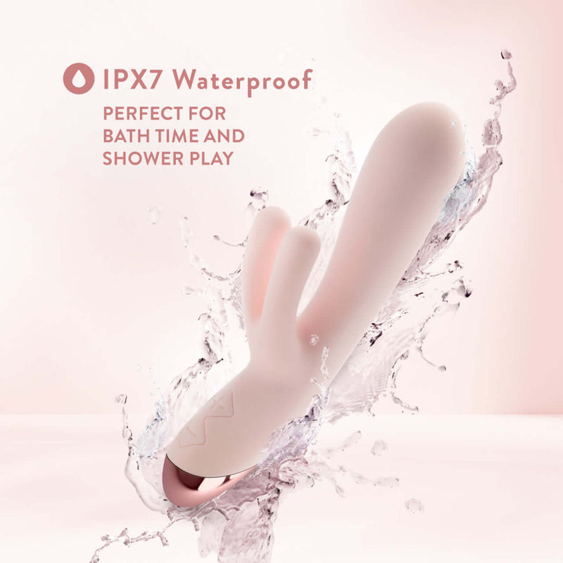 Blush Elora Pink Rabbit Vibrator splashing water, highlighting IPX7 waterproof feature perfect for bath time and shower play.