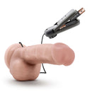 Dr Skin Dr Jay 8.75 inches Vibrating Cock with Suction Cup Vanilla next to a battery pack for adjustable vibrations.