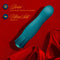 Oh My Gem Fierce Rechargeable Silicone Vibrator in blue topaz against a plush red background.