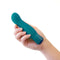 Fierce Blue Topaz rechargeable silicone vibrator held in hand for G-Spot exploration.