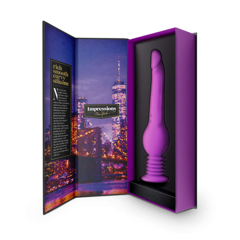 Impressions New York Gyro-Quake Purple Dildo Gen 2 in open packaging with cityscape background