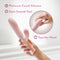 Holding Blush Fraya Pink Rabbit Style Vibrator made with platinum cured silicone, showing its satin smooth feel and squishy head.