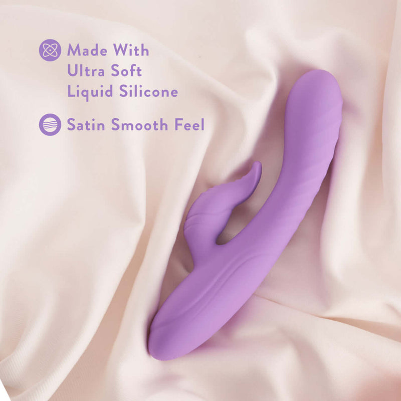 Purple Blush Evelyn Rabbit Vibrator made with ultra-soft liquid silicone for a satin smooth feel on fabric background