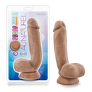 Au Naturel Macho Dildo 8.75 inch Tan displayed in packaging, showcasing realistic dual-density design.